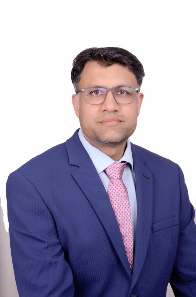 Dr. Goyal with Patient